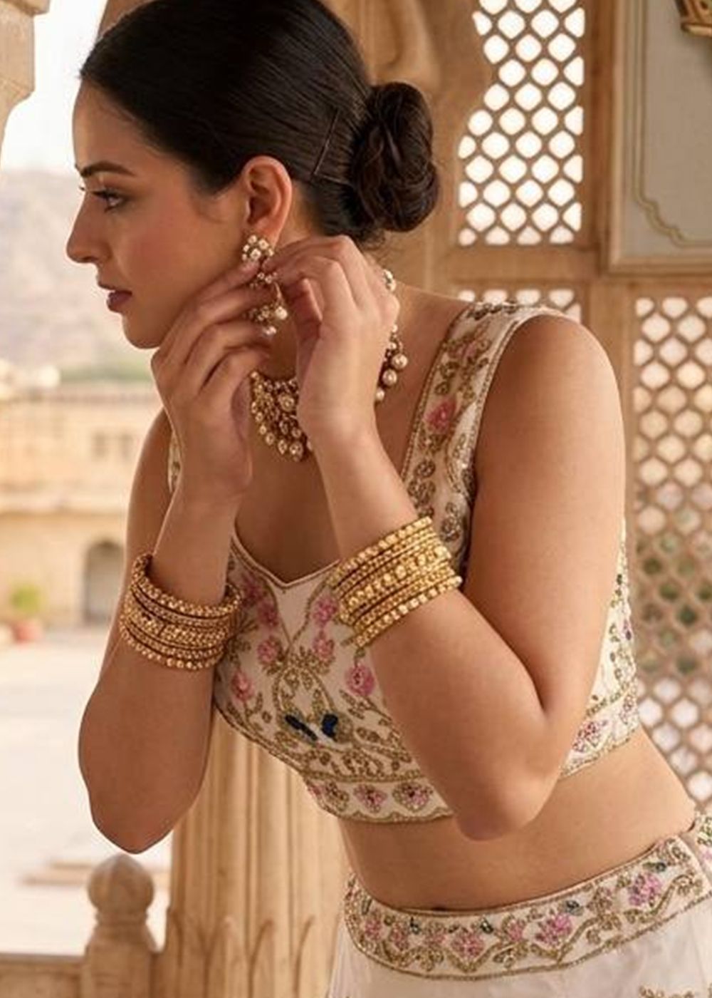 Off White Georgette Lehenga Choli With Zari Embroidery