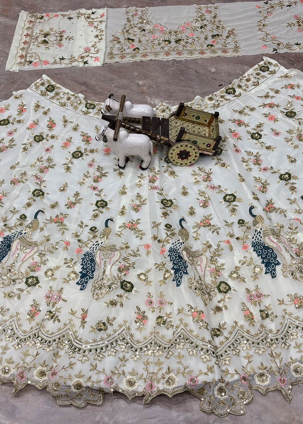 Off White Georgette Lehenga Choli With Zari Embroidery
